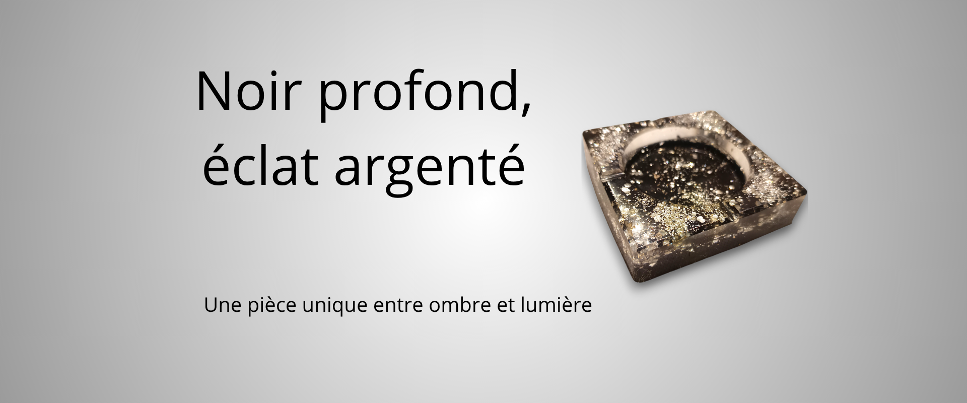 Noir profond, éclat argenté Sous-titre Une pièce unique entre ombre et lumièreer